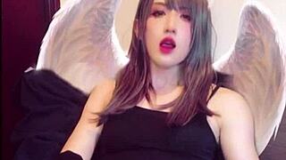 beautiful ladyboy masturbates on cam while crossdressing