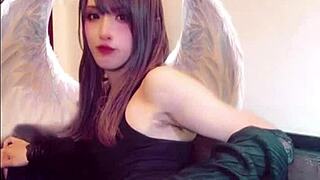 beautiful ladyboy masturbates on cam while crossdressing