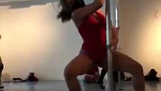 diosa argenta performs pole dance with another