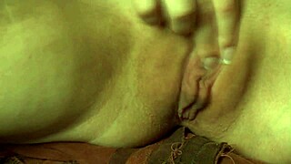 Chained beauty masturbates her shaved pussy in fantasy cosplay!