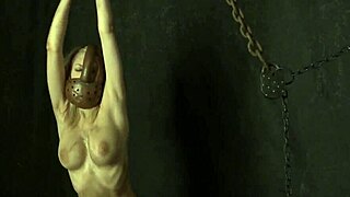 Chained beauty masturbates her shaved pussy in fantasy cosplay!