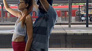 couple bangs wildly in public train terminal