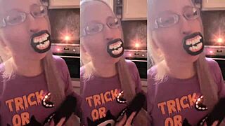 asmr blonde brushes long hair with lollipop in headphones