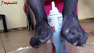 BRUNETTE IN PANTYHOSE DELIVERS MESSY FOOTJOB CREAMPIE