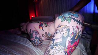 tattooed redhead bounces wildly on massive bbc creampie ride