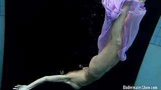 Hey, can you handle Aneta's big tits in purple dress underwater pool dive?