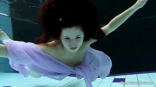 Hey, can you handle Aneta's big tits in purple dress underwater pool dive?