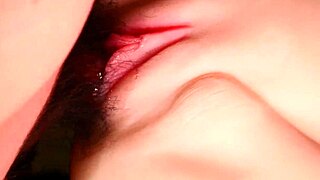 Close-up exploration of a beautiful woman's moist shaved pussy and wet vagina