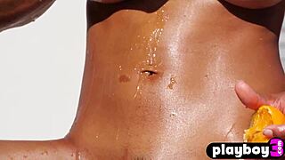 Petite Asian MILF Angel Constance shows off her perfect curves and assets