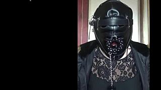 masked bisexual crossdresser gags on homemade dildo