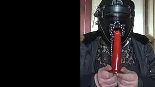masked bisexual crossdresser gags on homemade dildo