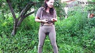 mature milf pisses shaved pussy in public garden jeans