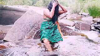 VILLAGE AUNTY BATHES OUTDOOR WATERFALL DIRTY TELUGU TALKS!