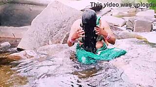 VILLAGE AUNTY BATHES OUTDOOR WATERFALL DIRTY TELUGU TALKS!