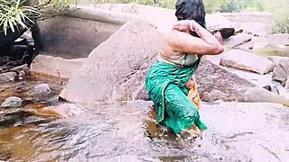 VILLAGE AUNTY BATHES OUTDOOR WATERFALL DIRTY TELUGU TALKS!