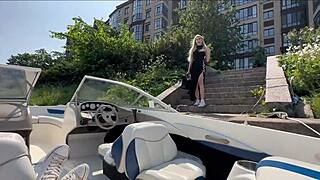 blonde beauty in lingerie blows and fucks boat captain outdoors