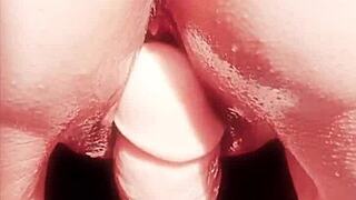 mature wife teases huge oiled pussy lips up close