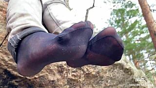 Gorgeous nylon feet teasing close-up in jeans outdoors compilation