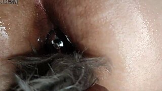 submissive slut takes her first anal plug stretching her tight asshole