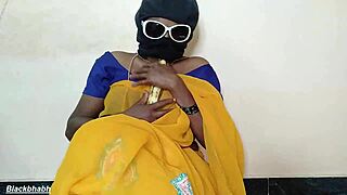 South Indian auntie stuffs huge banana deep in her pussy