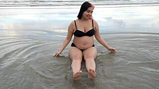 belle belinha the cute pregnant african teen sensually shows off her belly on the beach