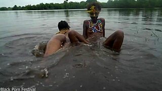 two skinny black lesbians bathe intimately in river