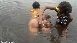 two skinny black lesbians bathe intimately in river