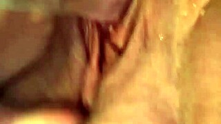 Freshly shaved pussy squirts hard on huge dildo close up