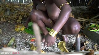 Busty african village wife makes medicines outdoors in forest
