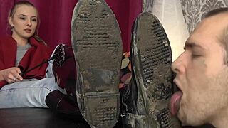 Slave licks extreme muddy boots clean