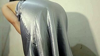 Sexy Girl In Satin Dress Gets Wet