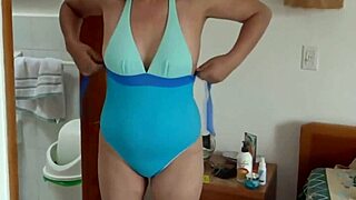 stepson records me putting on a bikini to show off on the beach