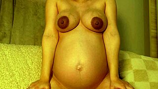 pregnant woman shows off body in tight bodysuit wow