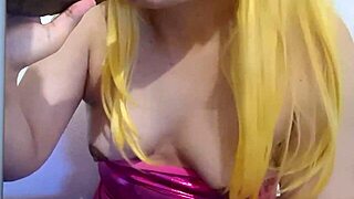Cute ladyboy in cosplay eats cum from toy