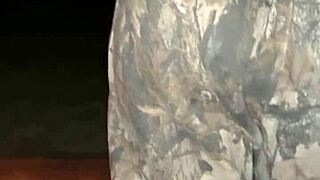 Outdoor teasing with wet pussy near campfire