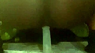 Ebony babe rides thick cock in closeup view