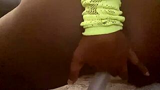 Ebony babe rides thick cock in closeup view
