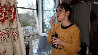 stepsister smokes a cigarette