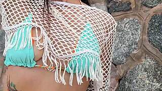 Hottie teases and flashes in bikini