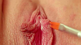 Tickling my wet pink pussy with paintbrush