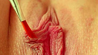 Tickling my wet pink pussy with paintbrush