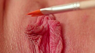 Tickling my wet pink pussy with paintbrush