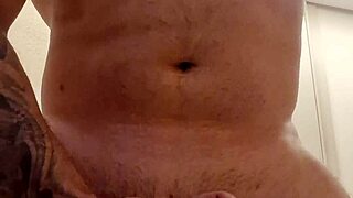 Muscular firefighter does gay striptease