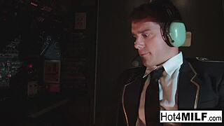 Flight attendant with big fake tits takes cock in the cockpit